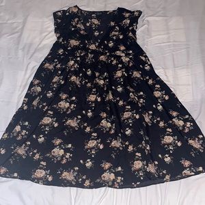Worn 1 time. Black mini dress with floral pattern Size Large
